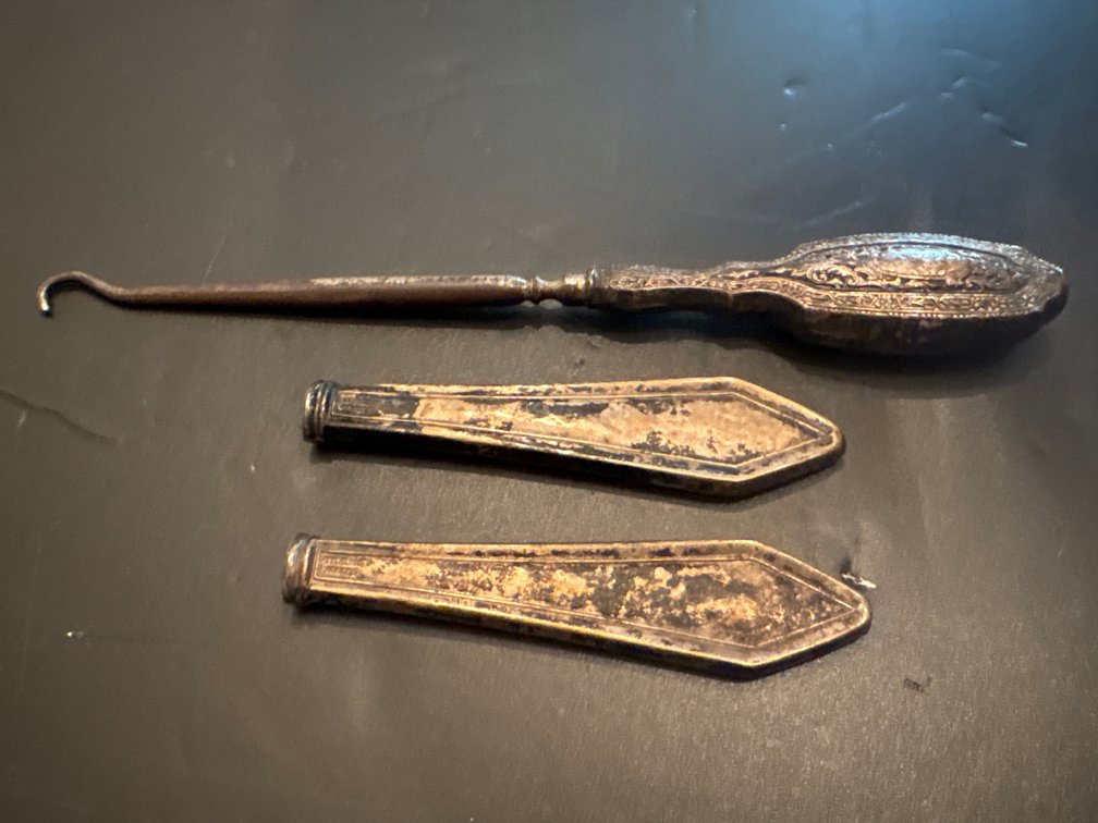 sterling silver-handled button hook and handles