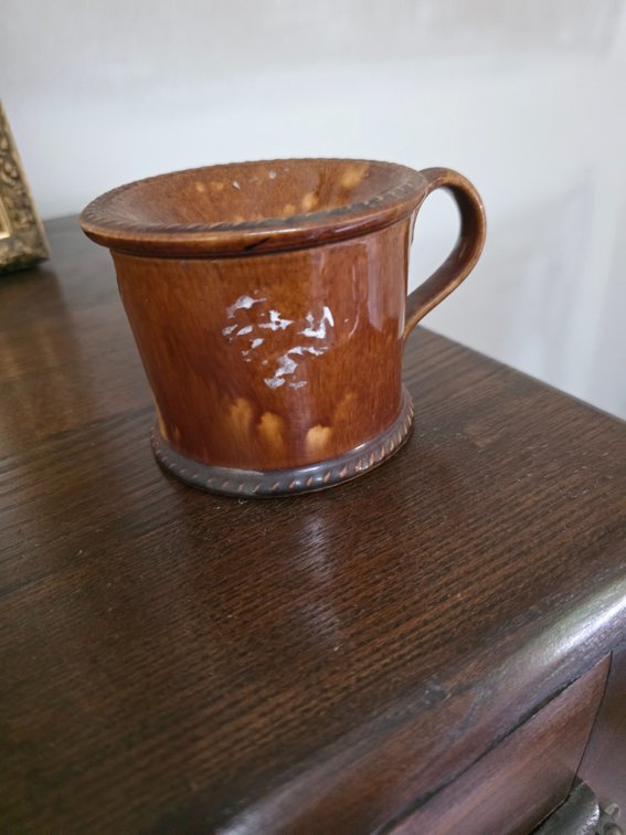 Bennington pottery piece featuring a mottled brown Color