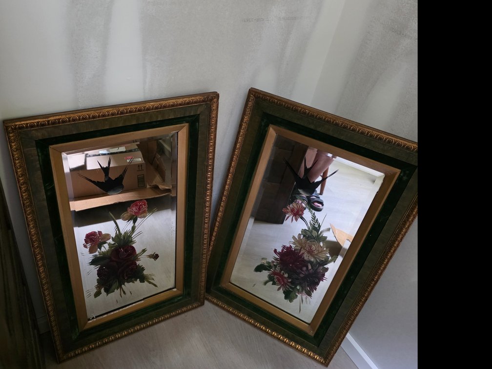 Victorian bevelled wall mirror featuring a charming reverse-painted bouquet of red roses and a swooping swallow