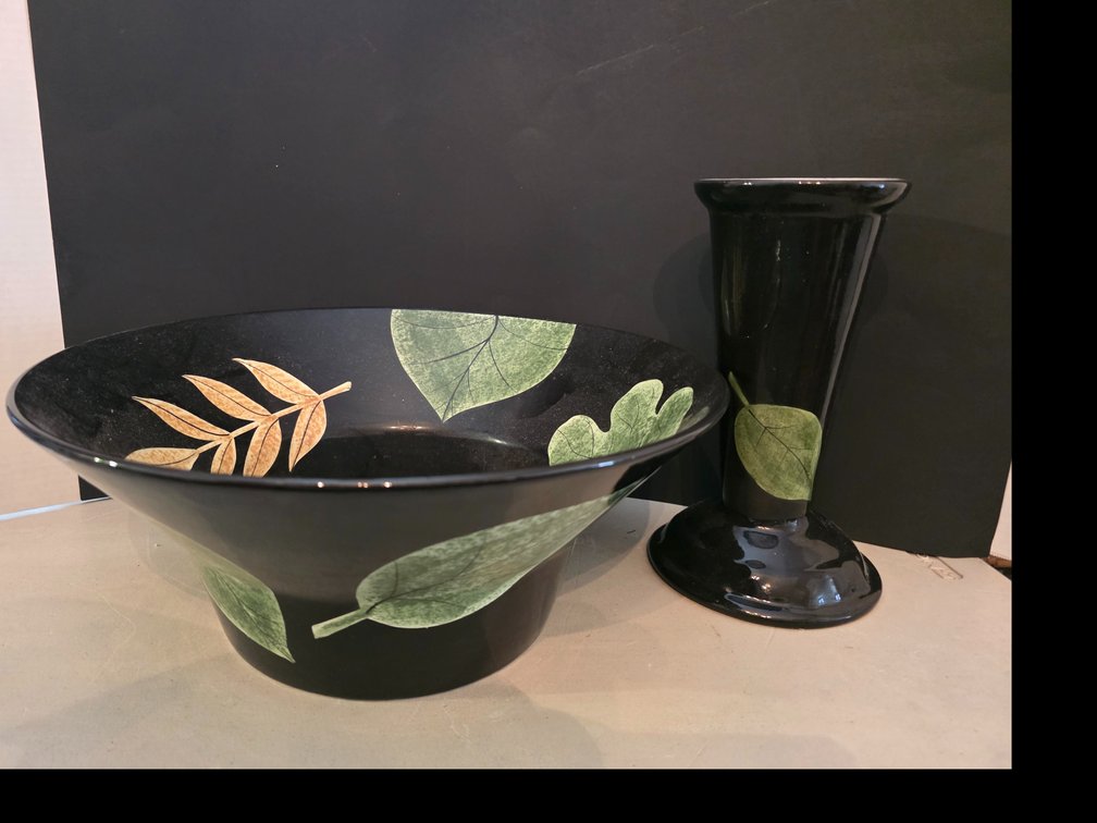 Large black decorative  bowl decorated with painted green and gold  Leafs:  Black  trumpet-shaped vase featuring a hand-painted green leaf design