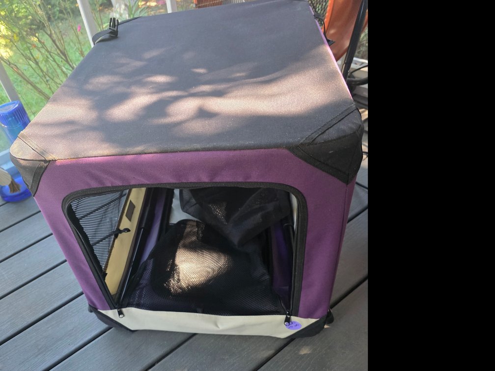 Purple and beige collapsible soft-sided pet crate,