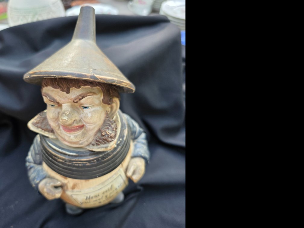 Vintage  French figural terracotta lidded tobacco jar or humidor shaped like a man in a barrel, featuring the French inscription "Honi soit qui mal y pense"