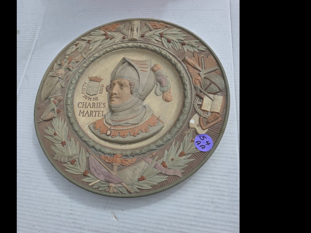 Vintage decorative wall plate (charger) featuring a high-relief profile bust of the historical figure