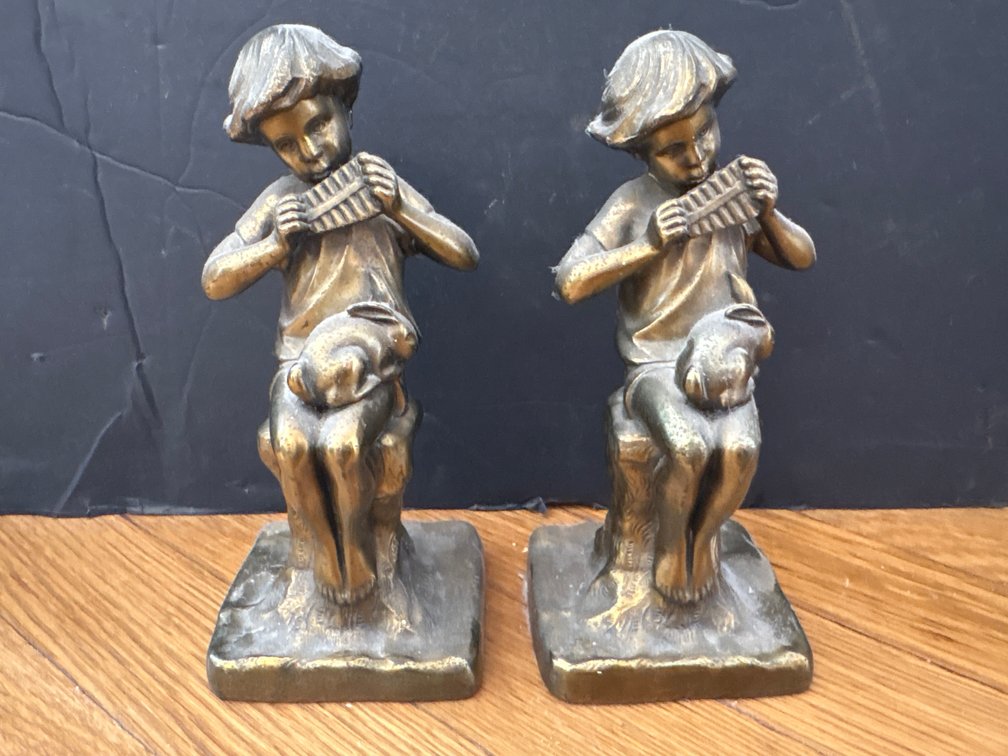 Metal Bookends – Young Boy Playing Flute / Panpipes with Rabbit on Tree Stump
