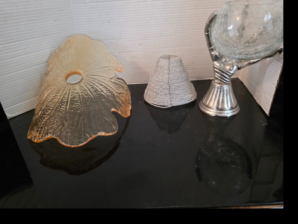Translucent golden-amber art glass Lamp Shade, silver seed bead mini lamp shade or tea light cover,decorative silver-toned skeleton hand holding a clear crackle-glass bowl,