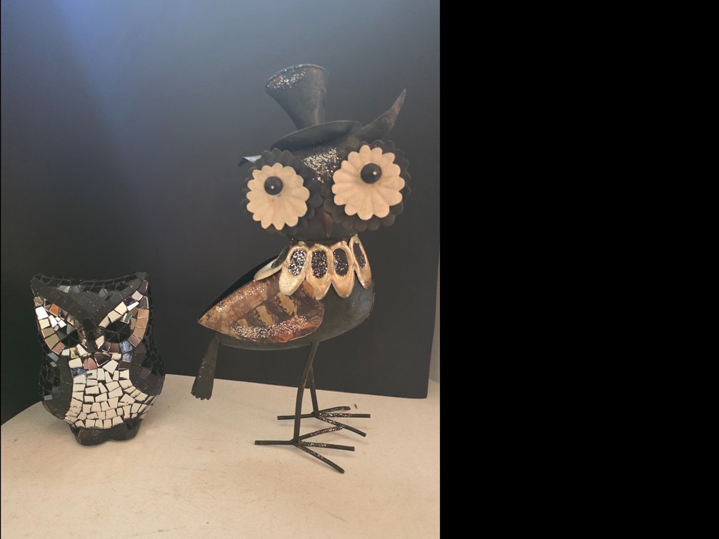Owl Mosaic Black figure,  metal owl figurine features a top hat, large circular flower-like eyes, and a patterned wing accent.