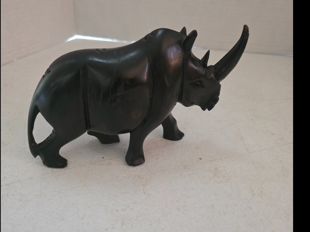Ebony hand-carved black wooden rhinoceros figurine