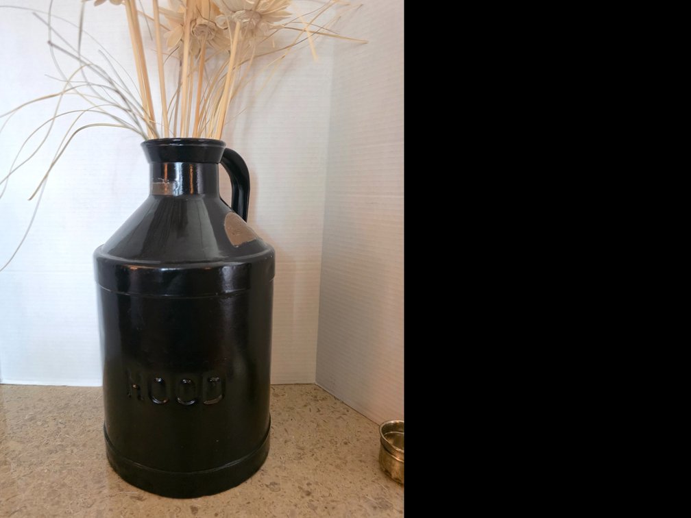 Hood black metal dairy milk can,