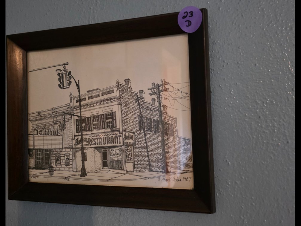 Framed pen-and-ink architectural illustration is a 1987 work by local Richmond artist Eliza B. Askin,