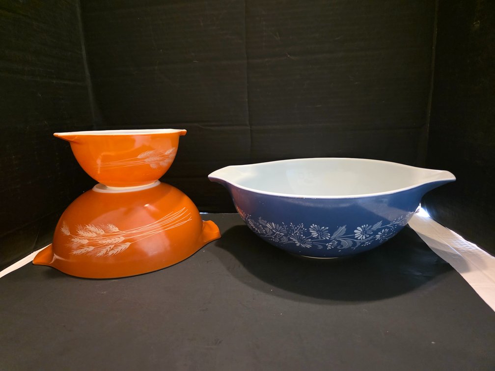 Vintage Pyrex Autumn Harvest orange Cinderella-style mixing bowl featuring a white wheat sheaf design., Pyrex Colonial Mist Cinderella Mixing Bowl