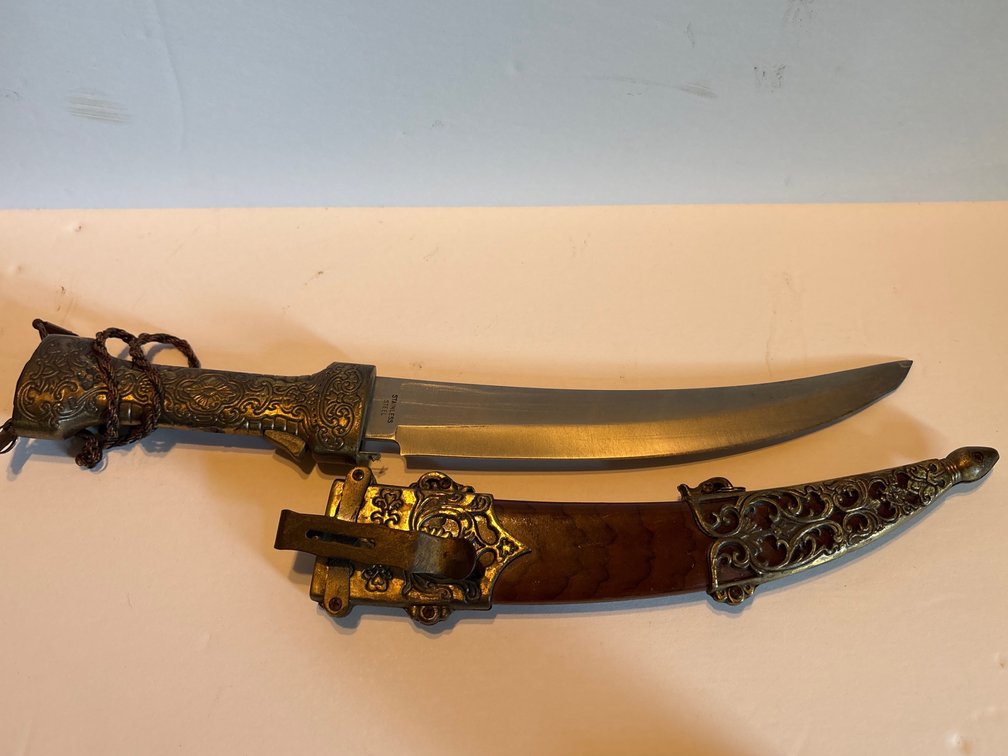 Dagger with Scabbard and Intricate Brass-Tone Hilt