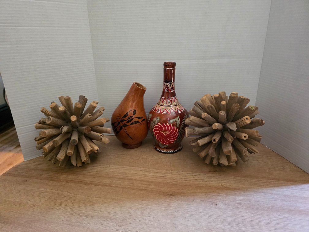 Handcrafted reddish-brown wood bottle vase with a bulbous body, a narrow neck, handcrafted decorative vase featuring a  painted dragonfly design:  Wood Orbs