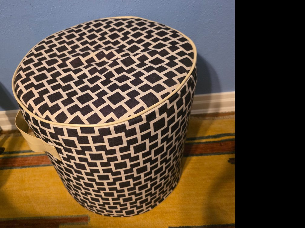 Indoor Bean Pouf in a geometric navy and white pattern.