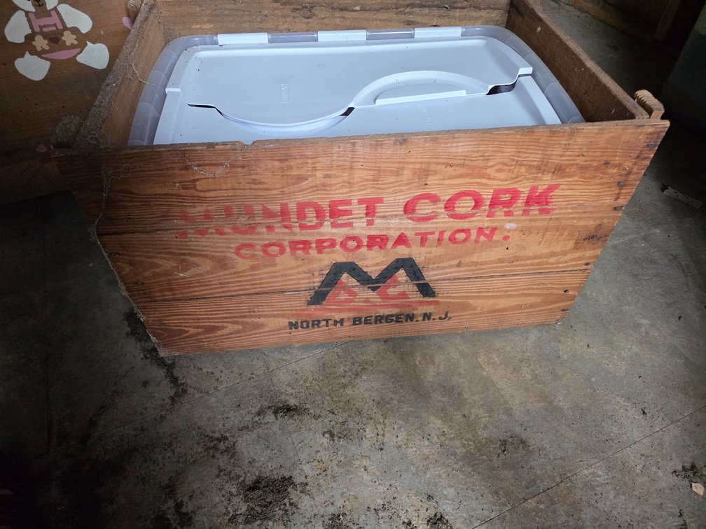 Vintage wooden shipping crate and storage box from the Mundet Cork Corporation
