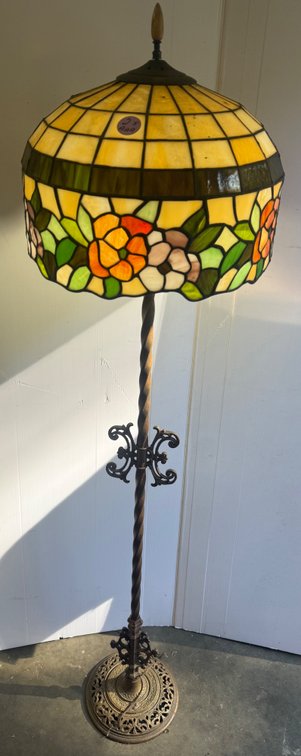 Elegant Tiffany-style stained glass floor lamp with ornate twist-stem metal base.  Beautiful!