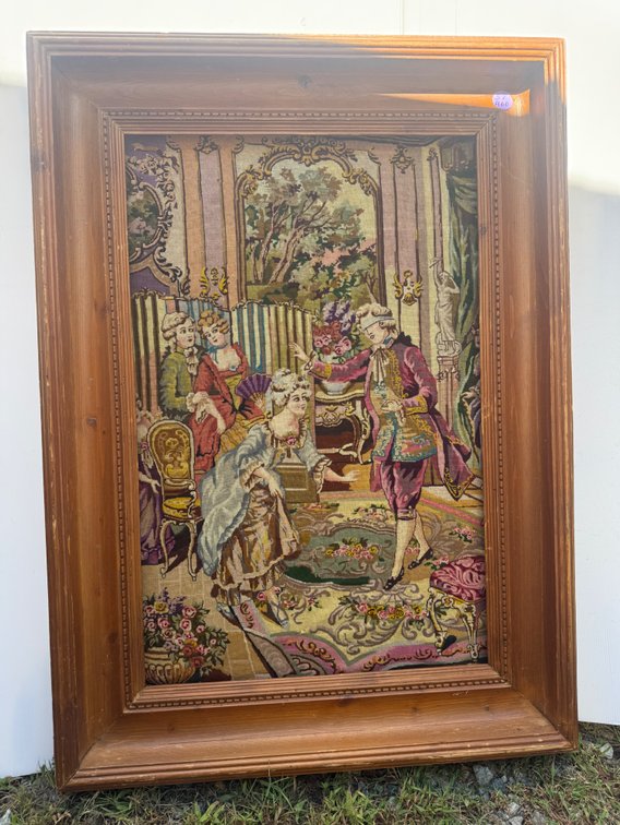 French-style pictorial wall tapestry featuring an 18th-century parlor scene in a Deep carved wooden frame.
