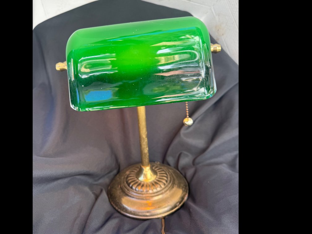 Banker's desk lamp featuring a green emerald glass shade, a