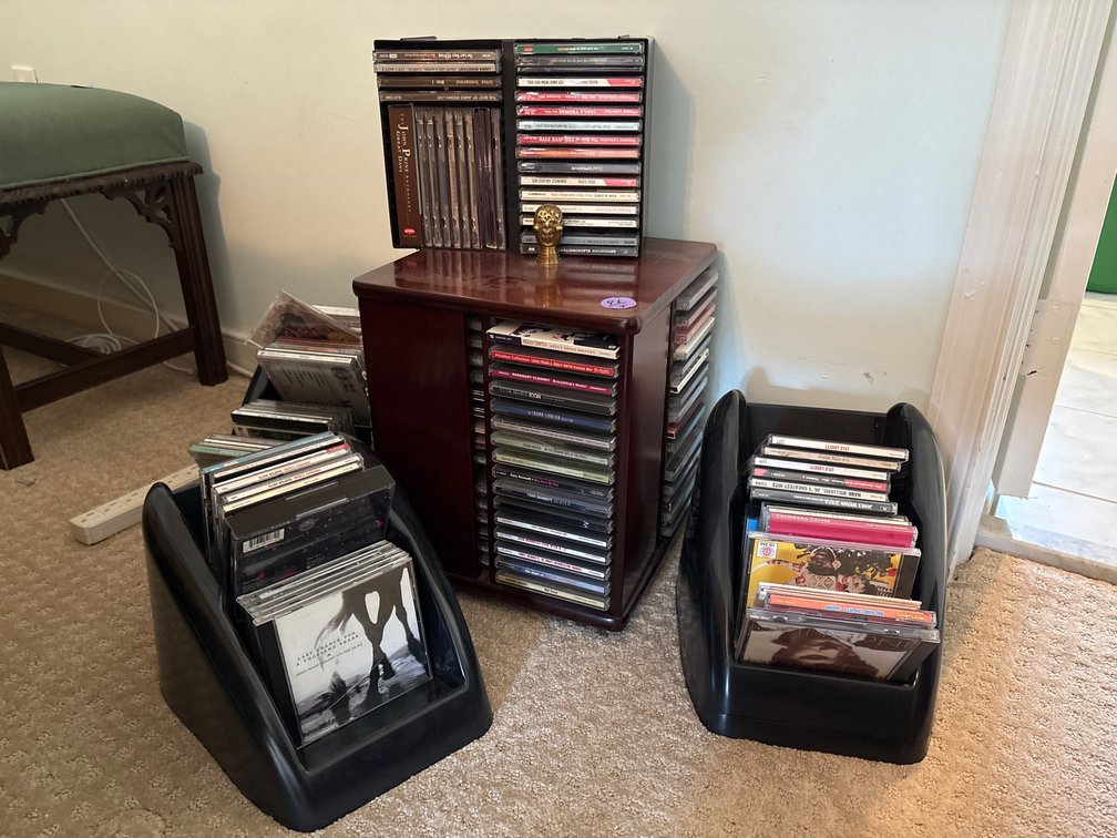 Rotating Wooden CD Tower Storage Rack & Black Media Bins with Large Assorted CD Music Collection and DVDs