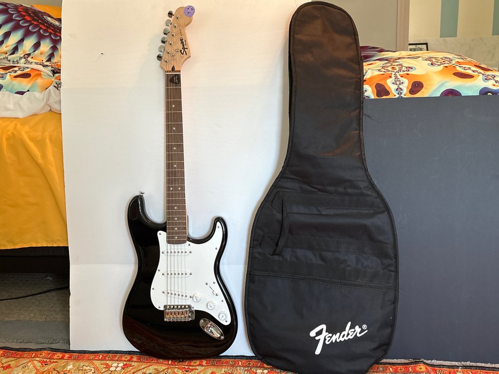 Squier by Fender Stratocaster Electric Guitar – Gloss Black with White Pickguard & Fender Gig Bag