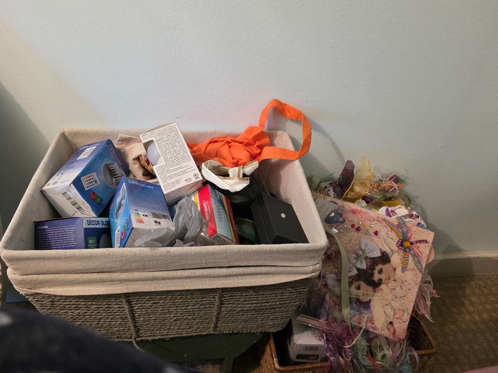 (2)  Paper Rope Baskets , with contents, 1 brown Storage Bin , Waffle Maker