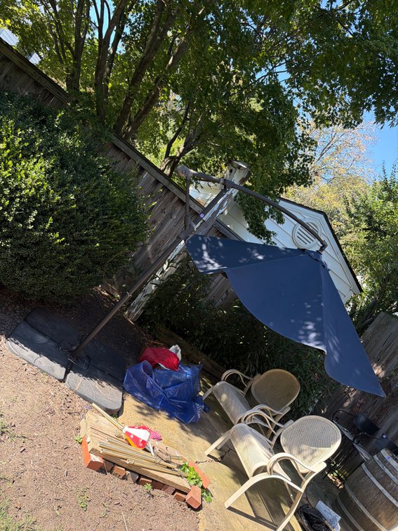 Outdoor patio umbrella and stand