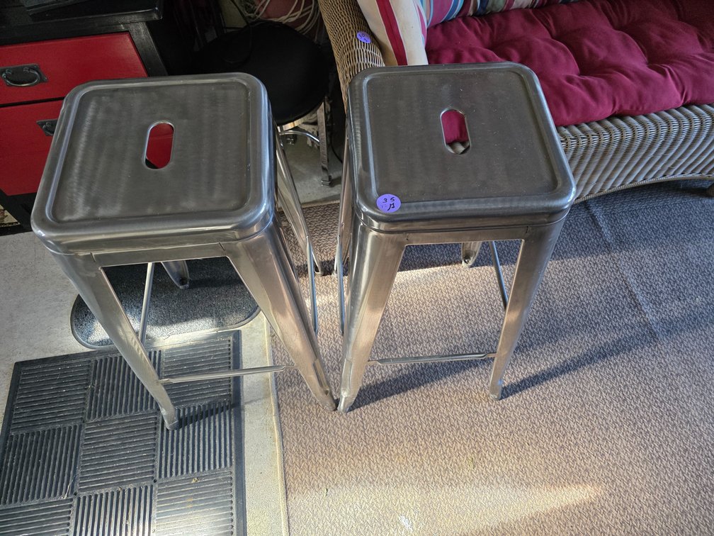 Industrial-style, backless metal counter- or bar-height stools