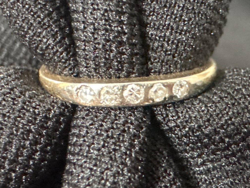 .031 Ounces Gold Wedding Band with Stones