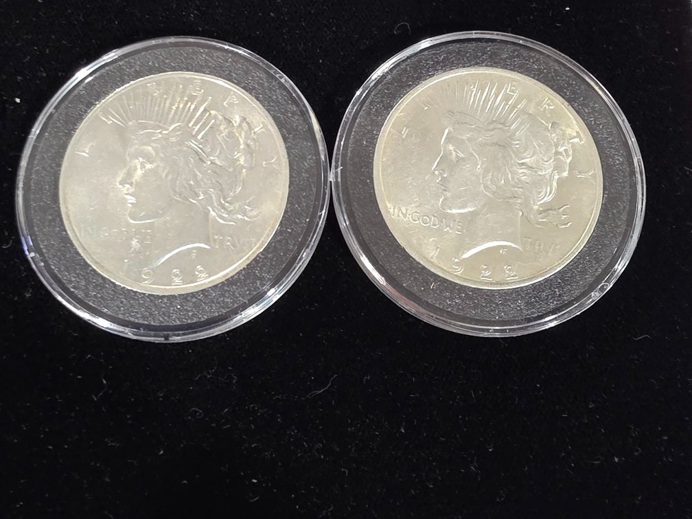 AU. Peace Dollars