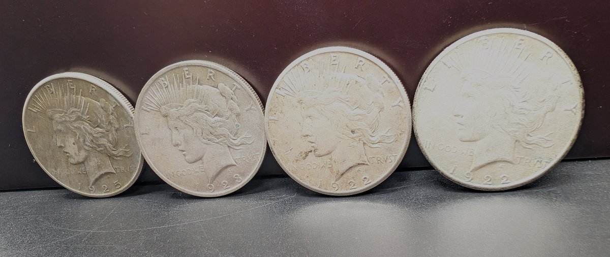 (2) 1922-S, 1923, & 1925 Peace Silver Dollars