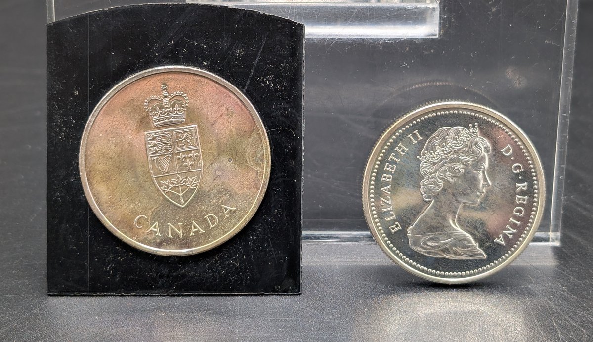 (2) Canadian Silver Dollars