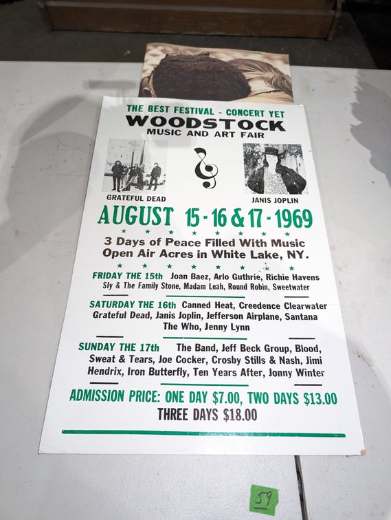 Woodstock 1969 Sign and Woodstock by the Numbers Book
