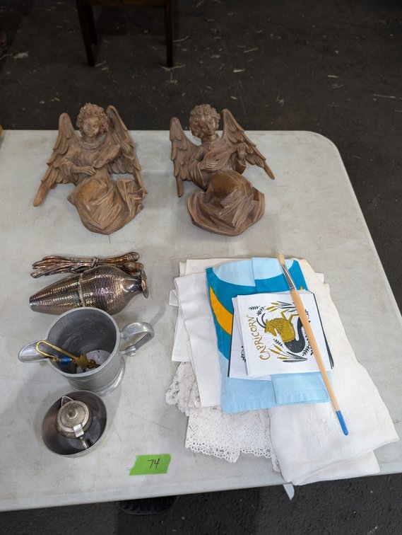 Hand-Carved Wooden Angels, Silver-Plated Tableware, and Linens