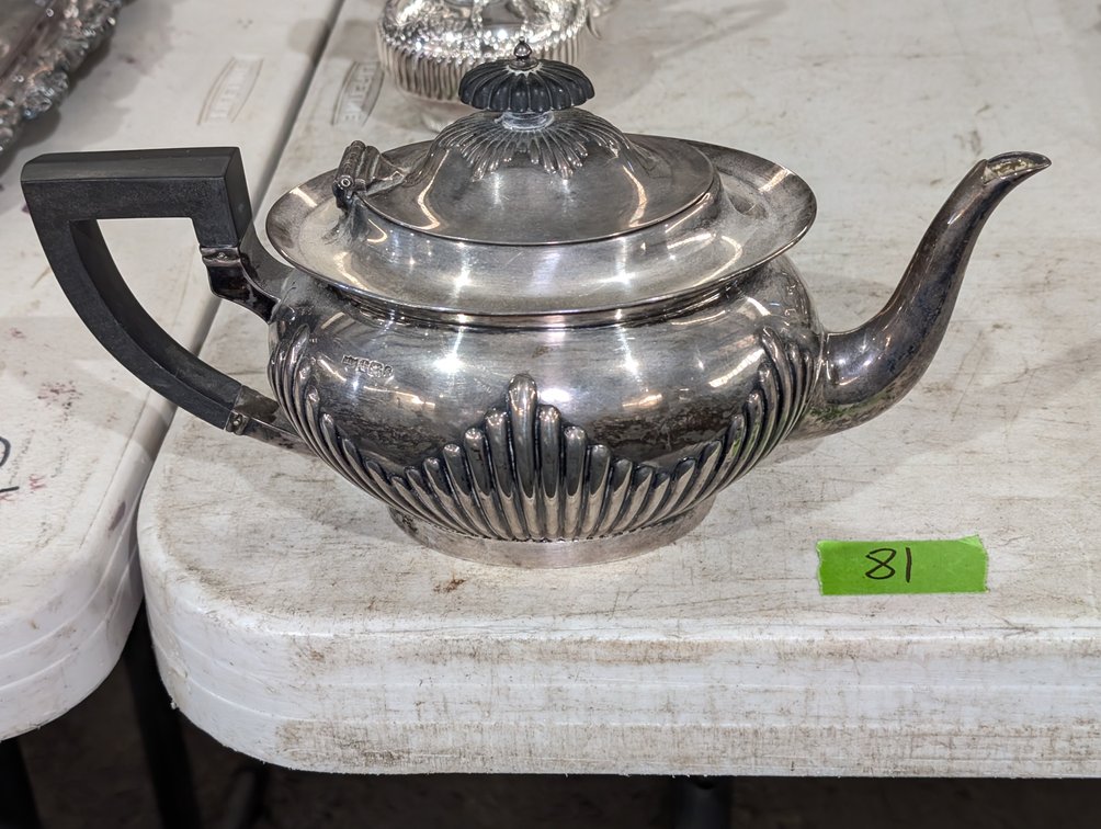Antique Silver-Plated Teapot with Scalloped Base and Ebonized Wood Handle