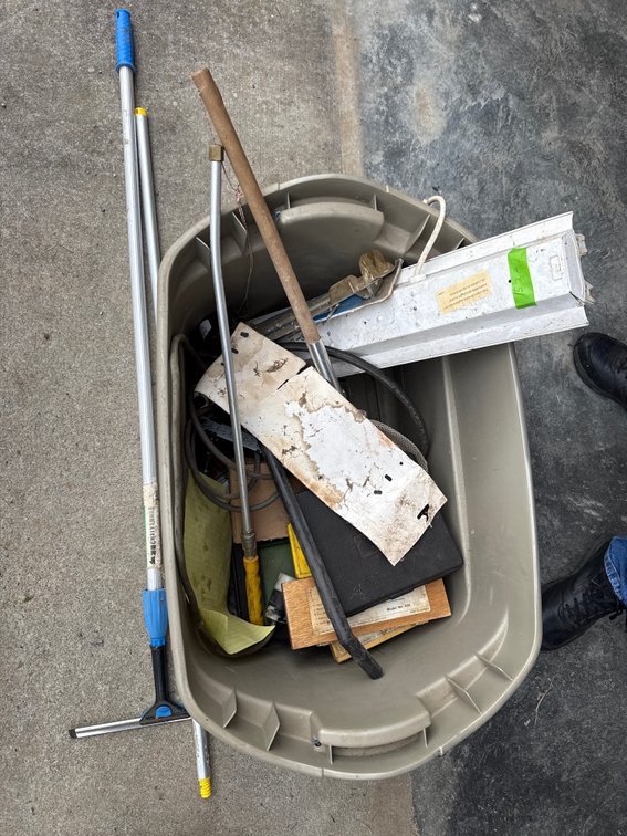 Beige tote with tools and squeegee