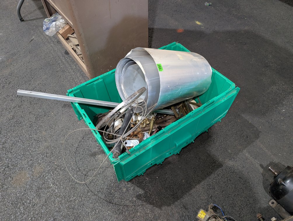 Green Plastic Storage Tote Filled with Aluminum Sheet Metal & Scrap Hardware