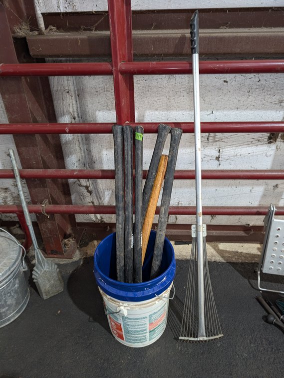 Plastic Storage Bucket Filled with Wooden Tool Handles & Metal Lawn Rake