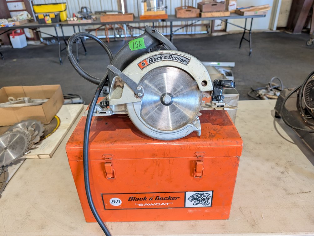 Black & Decker "Sawcat" Electric Circular Saw with Orange Metal Storage Case