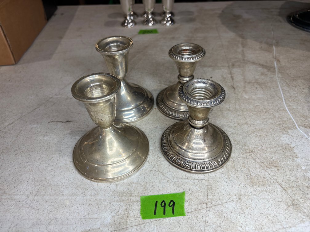 Group of 4 Assorted Weighted Sterling Silver Candlestick Holders