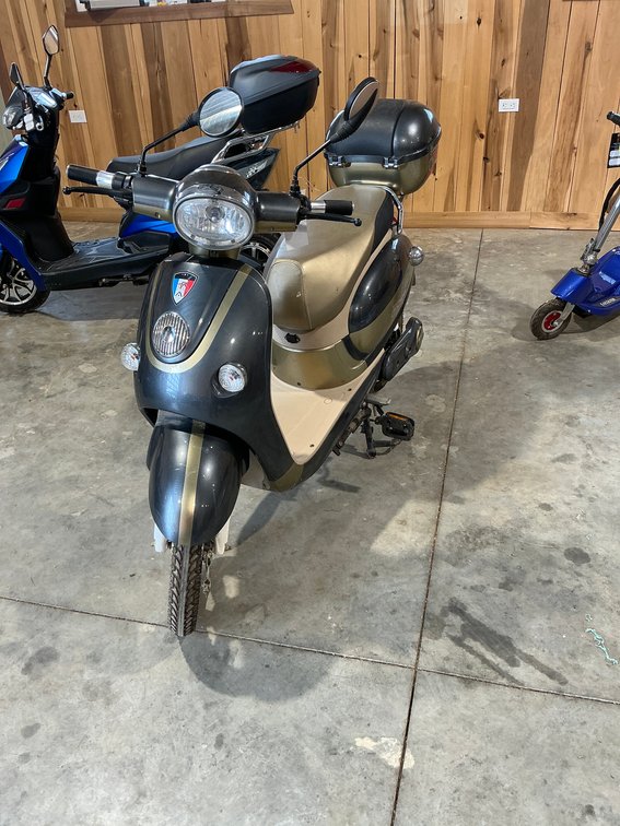 Sam’s Gold and Grey Electric Bike/Scooter