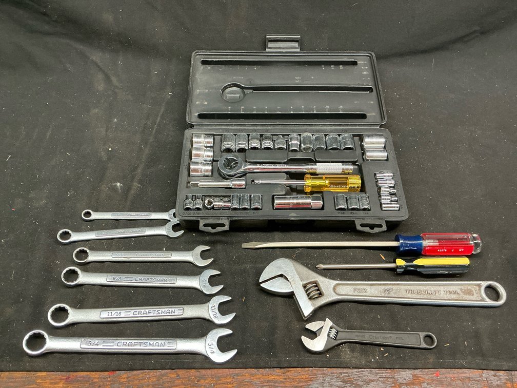 Assorted wrenches, sockets and screwdrivers