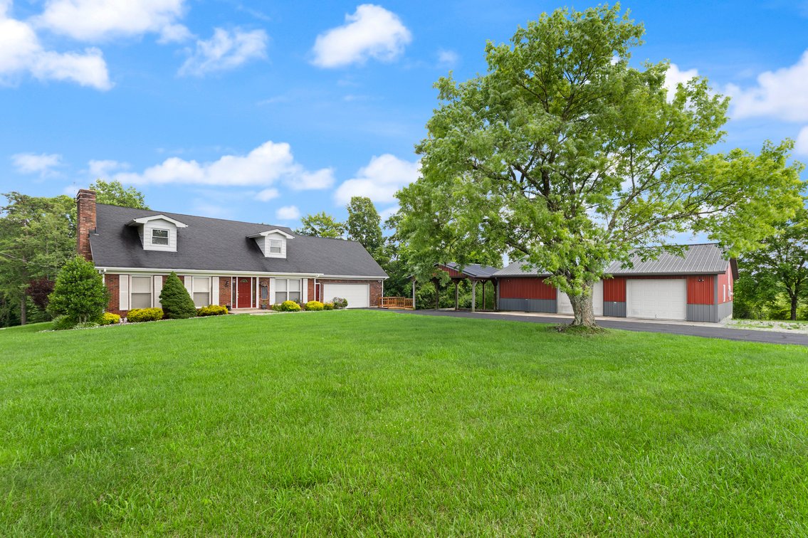 Image for Harrison County Real Estate Auction,  Cape Cod on 9.87 Acres, Inground Pool, Koi Pond & Finished Walkout - ONLINE AUCTION ONLY