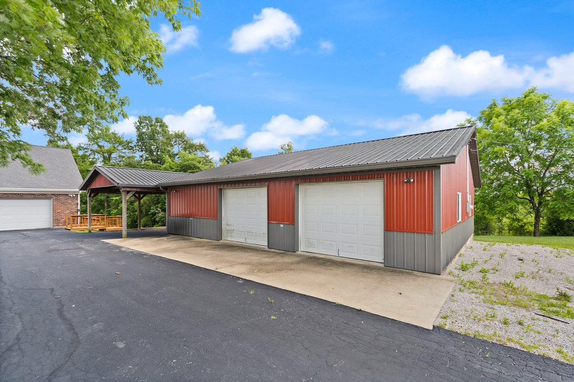 Image for Harrison County Real Estate Auction,  Cape Cod on 9.87 Acres, Inground Pool, Koi Pond & Finished Walkout - ONLINE AUCTION ONLY