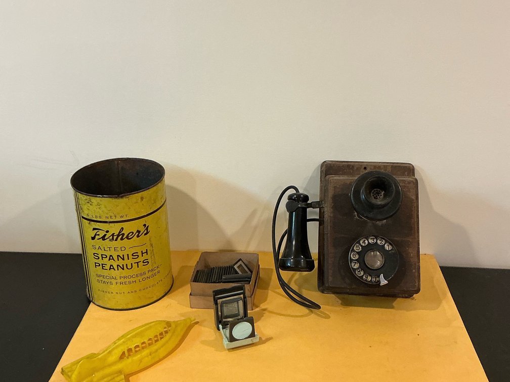 Antique map slides, rotary phone