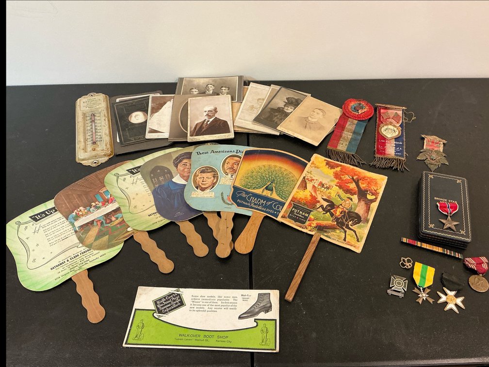 Medals , misc hand fans , thermometer 