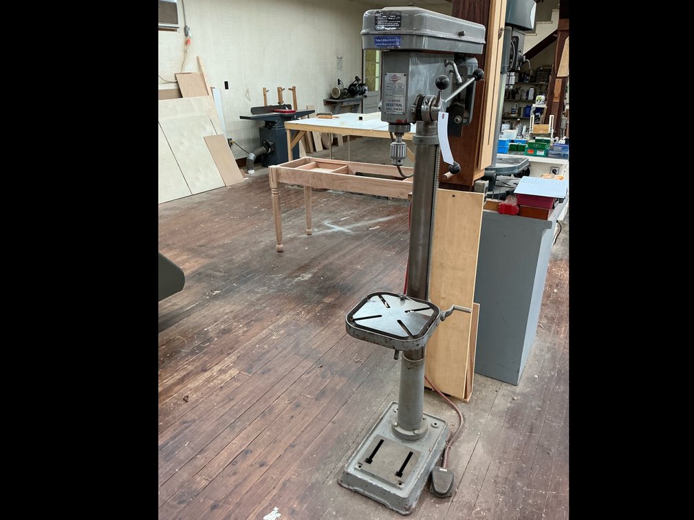 Orbit drill press with foot pedal