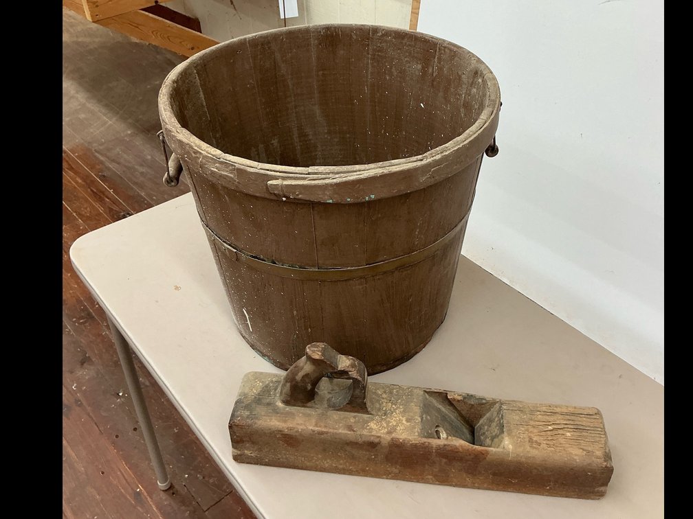 Wooden hand  plane and antique bucket 