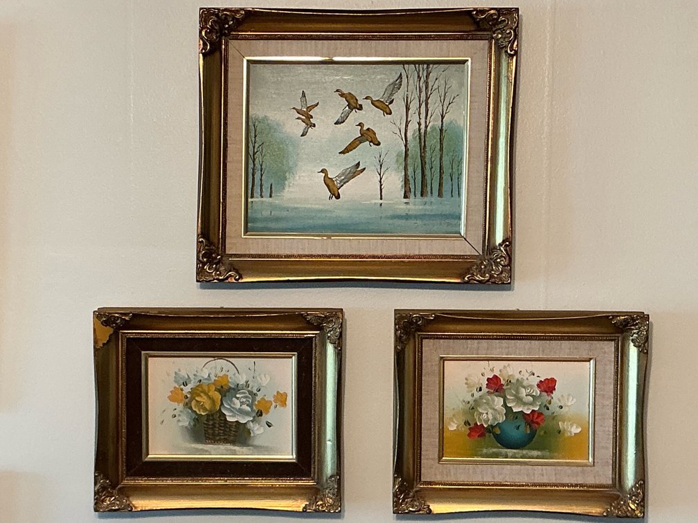 3 gold colored framed art