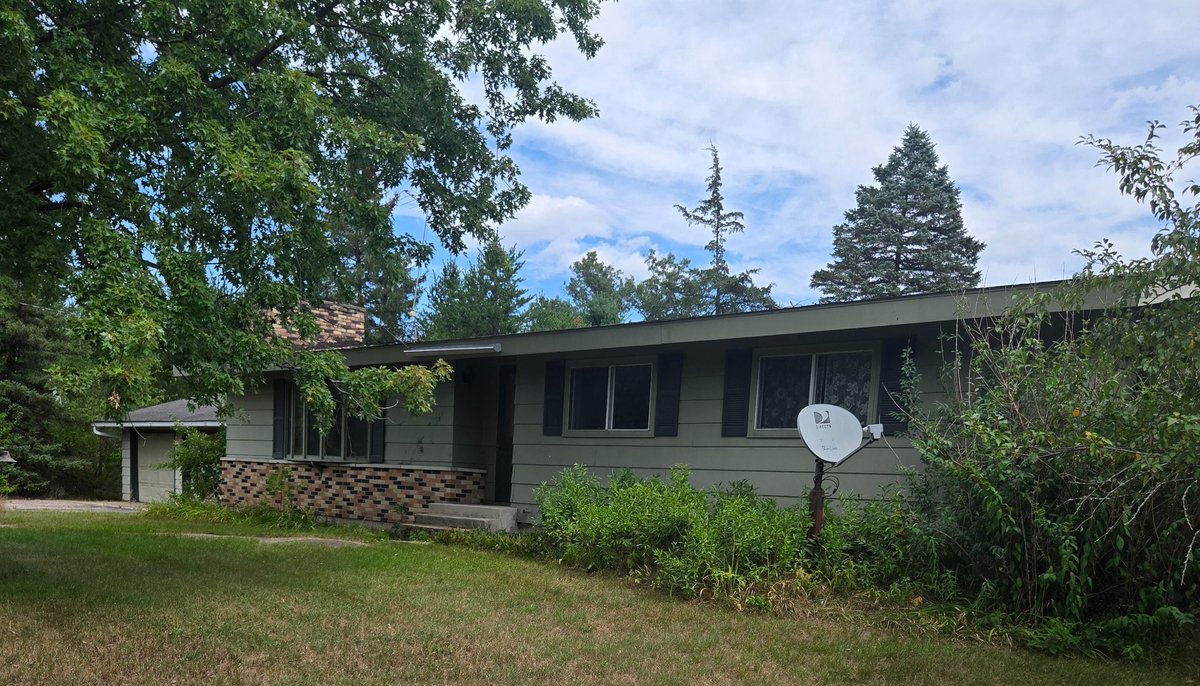 Real Estate three bedroom two bath home in Necedah on three acres