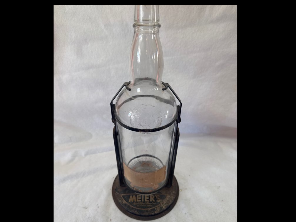 Meier's Wine Cellars Glass Bottle in Metal Tilting Cradle Stand