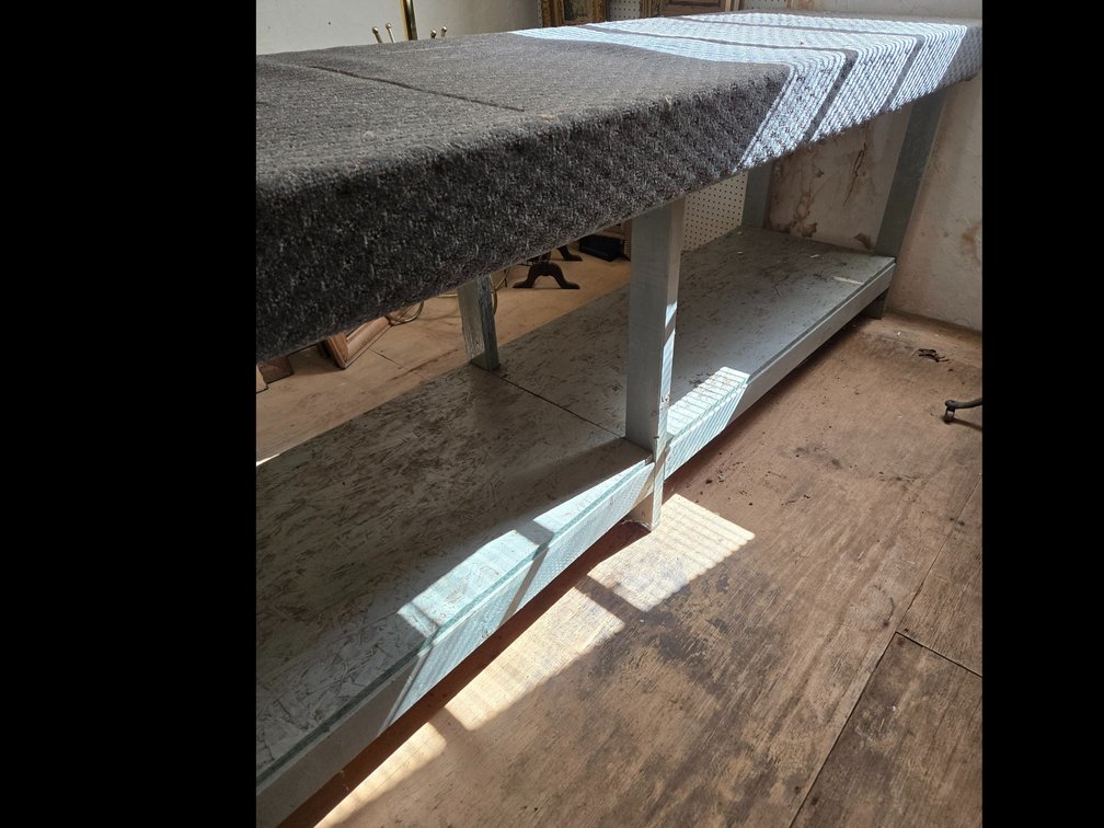 Carpet-Topped Wooden Workbench with Lower Shelf